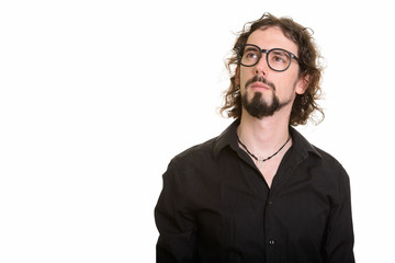 Handsome Caucasian man thinking and looking up