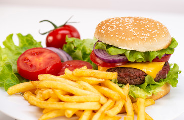 Burger with French fries cutlet with cheese and tomato