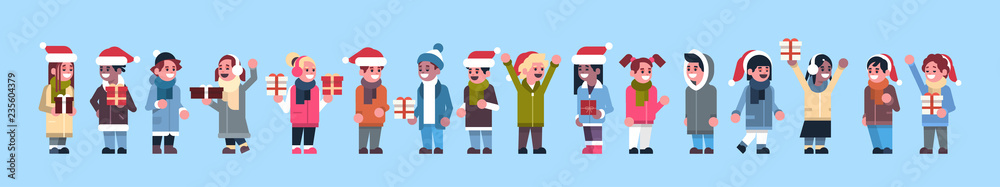 Wall mural mix race people group wearing winter clothes red hat hold gift box present merry christmas holiday happy new year concept full length flat horizontal banner vector illustration