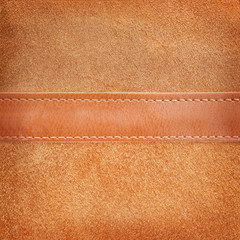 Brown leather with a linear stitch background.