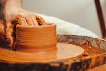 Potter makes a jug