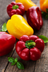 Bell peppers on a wooden background