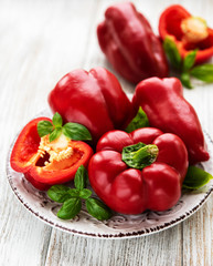 Bell peppers on a wooden background