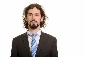 Portrait of handsome Caucasian businessman face looking at camera