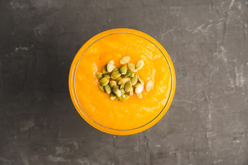 Refreshment and healthy autumn pumpkin drink. Selective focus. Shallow depth of field. 