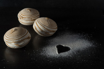 Coffee marshmallow with coffee, cacao and golden spoon. Warm, sweet moody food photo for coffee illustration