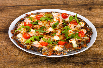 Pizza with salmon and mozzarella