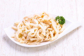 Marinated squid served parsley