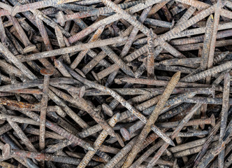 Old rusted gray nails uniformly frame-filling distributed