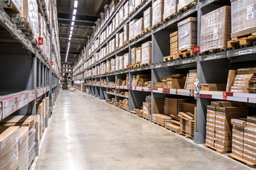 Fototapeta premium Background of virtual coke in shelves of large cargo warehouses