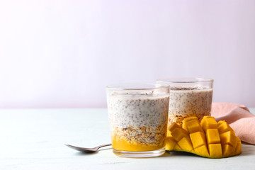 chia pudding with mango, granola and honey. Healthy dessert, proper nutrition, super food.