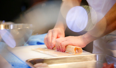 chef hands preparing japanese food, chef making sushi, Preparing Sushi roll