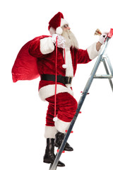 side view of old saint nick climbing up the ladder
