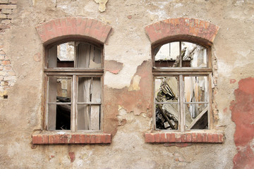Two old destroyed windows on abandoned house , Bosnia and Herzegovina