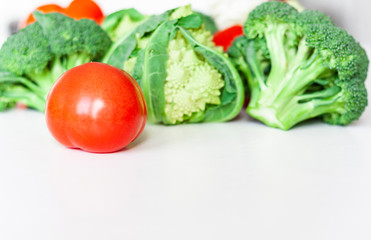 Vegetable variety on wooden white table. Selection of summer and autumn vegetables, space for text