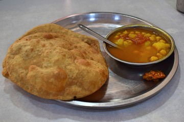 Typical breakfast in the streets of Delhi, India