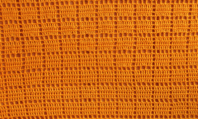 background texture of knitted orange squares for the desktop, site and other resources