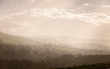 Misty valley near Skipton, West Yorkshire, England, UK.