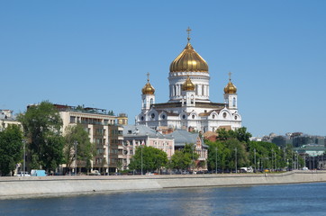 Fototapeta na wymiar View of the Cathedral of Christ the Saviour and Prechistenskaya embankment in Moscow, Russia