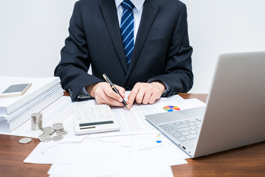 Male businessmen who account for tabular data