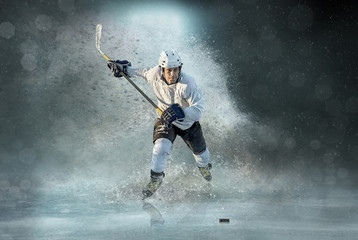 ice hockey Players in dynamic action in a professional - obrazy, fototapety, plakaty