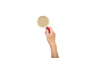 A hand is holding a cup with hot coffee on a white isolated background. Breakfast concept with coffee or tea. Good morning, night, insomnia. Flat lay, top view