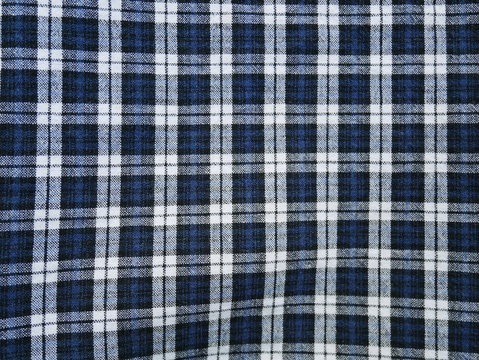 Square pattern fabric background. Scott chintz fabric for design.Plaid cotton texture.