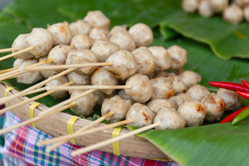 Closeup Grill pork balls pour on the market 