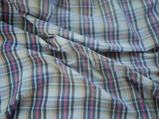 Square pattern fabric background. Scott chintz fabric for design.Plaid cotton texture.
