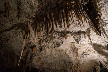 Interiors of Postojna Cave, Slovenia. Big caving area of Postojna. Underground halls, karst.