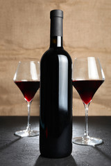 Antique bottle of vintage wine. Traditional alcoholic drink.