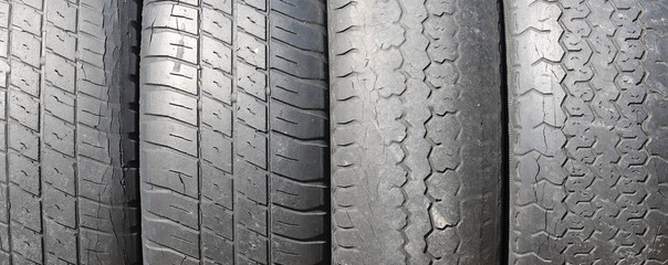 worn out bald old car tire close-up