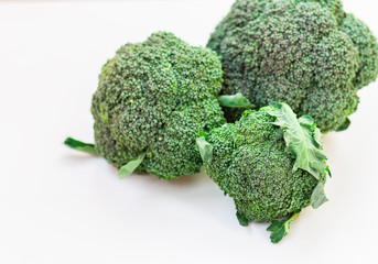 Broccoli inflorescence on white background isolated with space for text