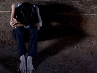traumatized and emotional child.stop violence and abused children,human trafficking concept