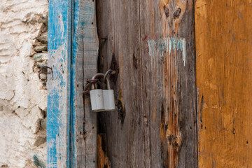 padlock on old wooden door