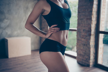 Cropped close-up belly thin graceful waist of stylish fitness mo