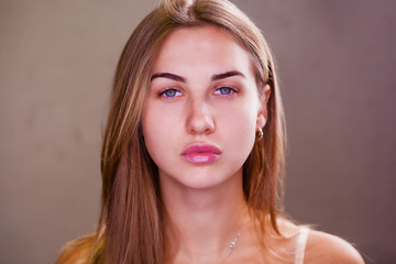 Naklejka premium Young blonde woman without makeup
