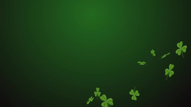 Saint Patrick's Day background. Clover leaves over dark green background