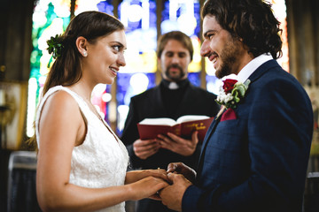 Bride and groom at the altar