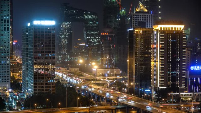 Timelapse. Beijing Landmark, Downtown Skyline at Night with Overpass and Traffic Flow,China