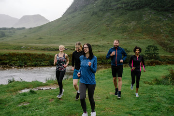 Group of friends jogging in the nature