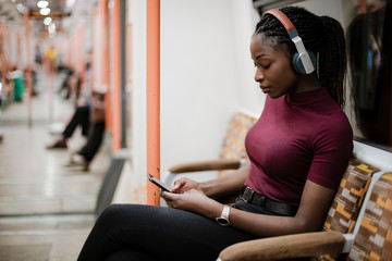 Woman traveling alone on a train