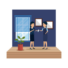 Fototapeta premium elegant businesswomen with smartphone in the office