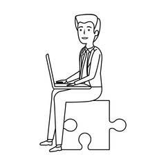 businessman sitting in puzzle piece with laptop
