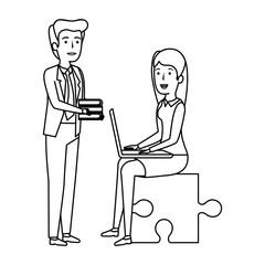 couple sitting in puzzle piece with laptop and books