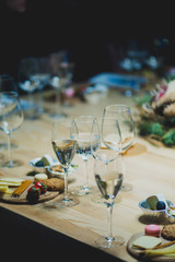 Table setting with wine and snacks, etiquette and event