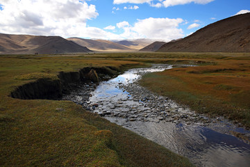 Veiw of Amazing summer landscape with Altai Mountains and winding river in Autumn of Western Mongolia