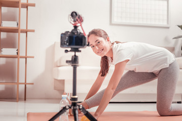 Fototapeta premium Young woman taking care of her body