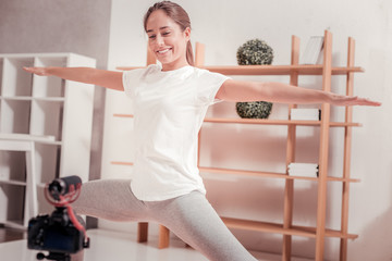 Slim woman exercising at home