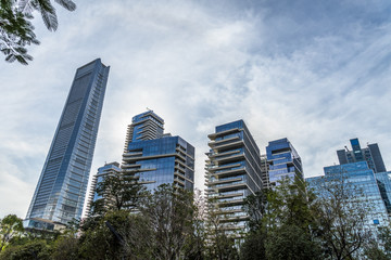 Fototapeta premium Modern office building against blue sky.